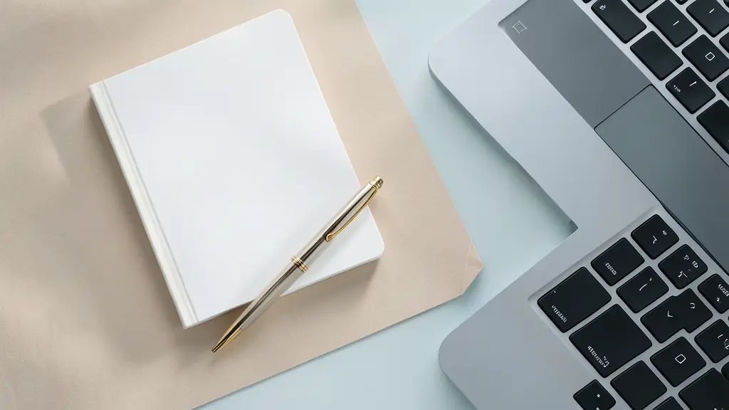 A top-down professional shot of a minimalist desk with a white notebook, a luxury pen, and a laptop, focusing on the texture of the paper and the clean office environment
